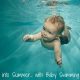 Baby swimming underwater with the title below