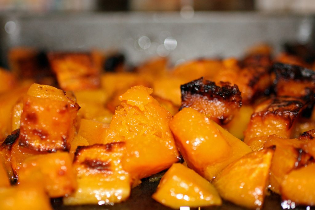 cubes of roasted butternut squash on a tray