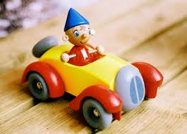 noddy in his yellow and red little toy car