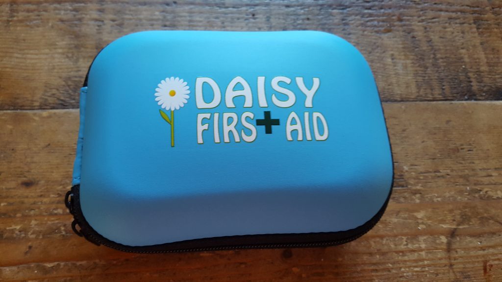 Blue case with Daisy First Aid written on it