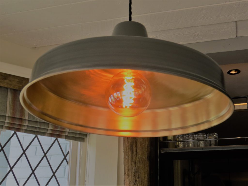 an industrial style hanging lamp fitting