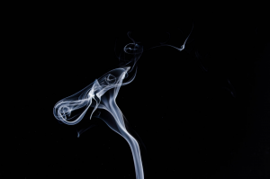 cigarette smoke on a black background
