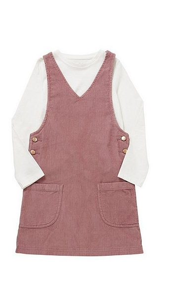 a pink corduroy dungarees dress with pockets on the front and a white long sleeved top underneath for a little girl