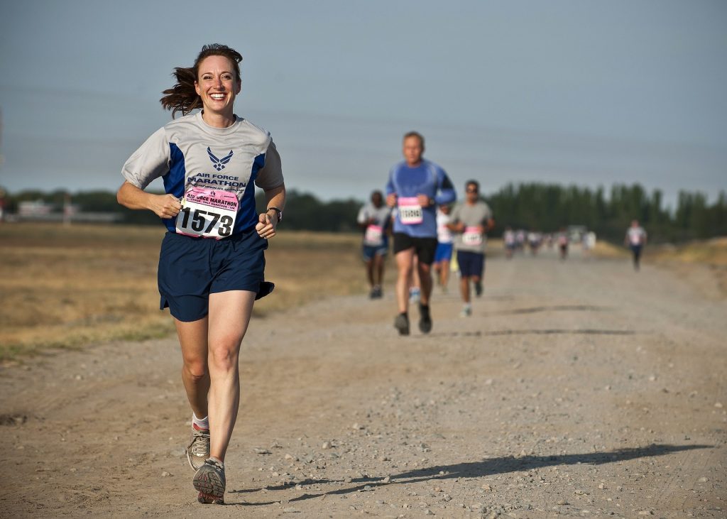 a woman running in a marathon