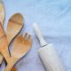 a collection of wooden kitchen utensils