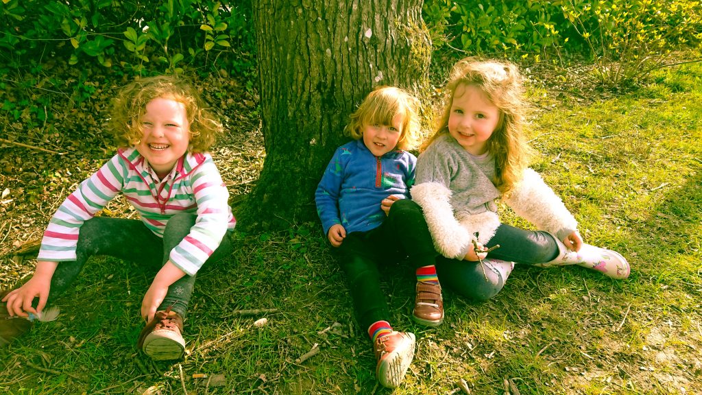 Alyssa and her friends sat under a tree
