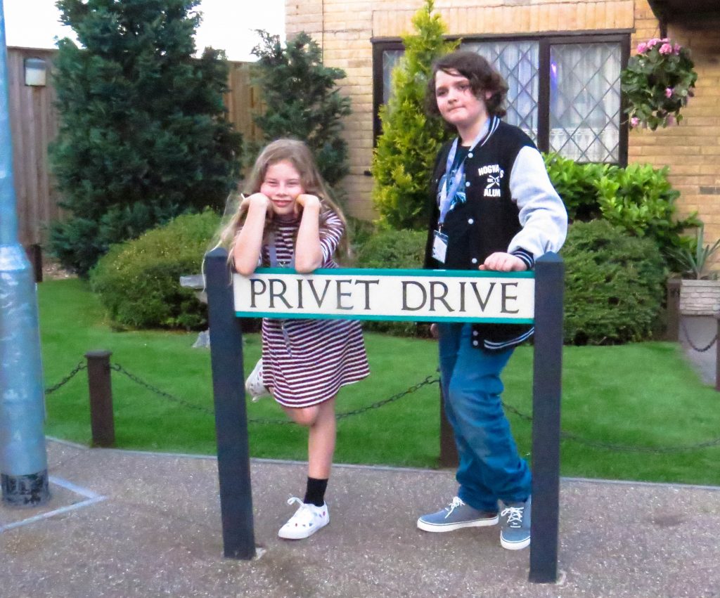 Rhiannon and Rowan standing outside privet drive