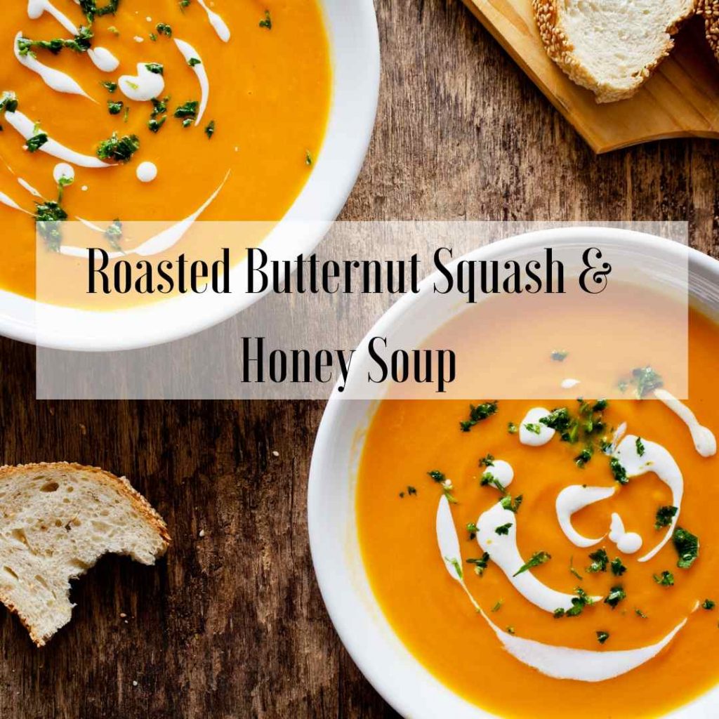 bowls of butternut squash soup and bread