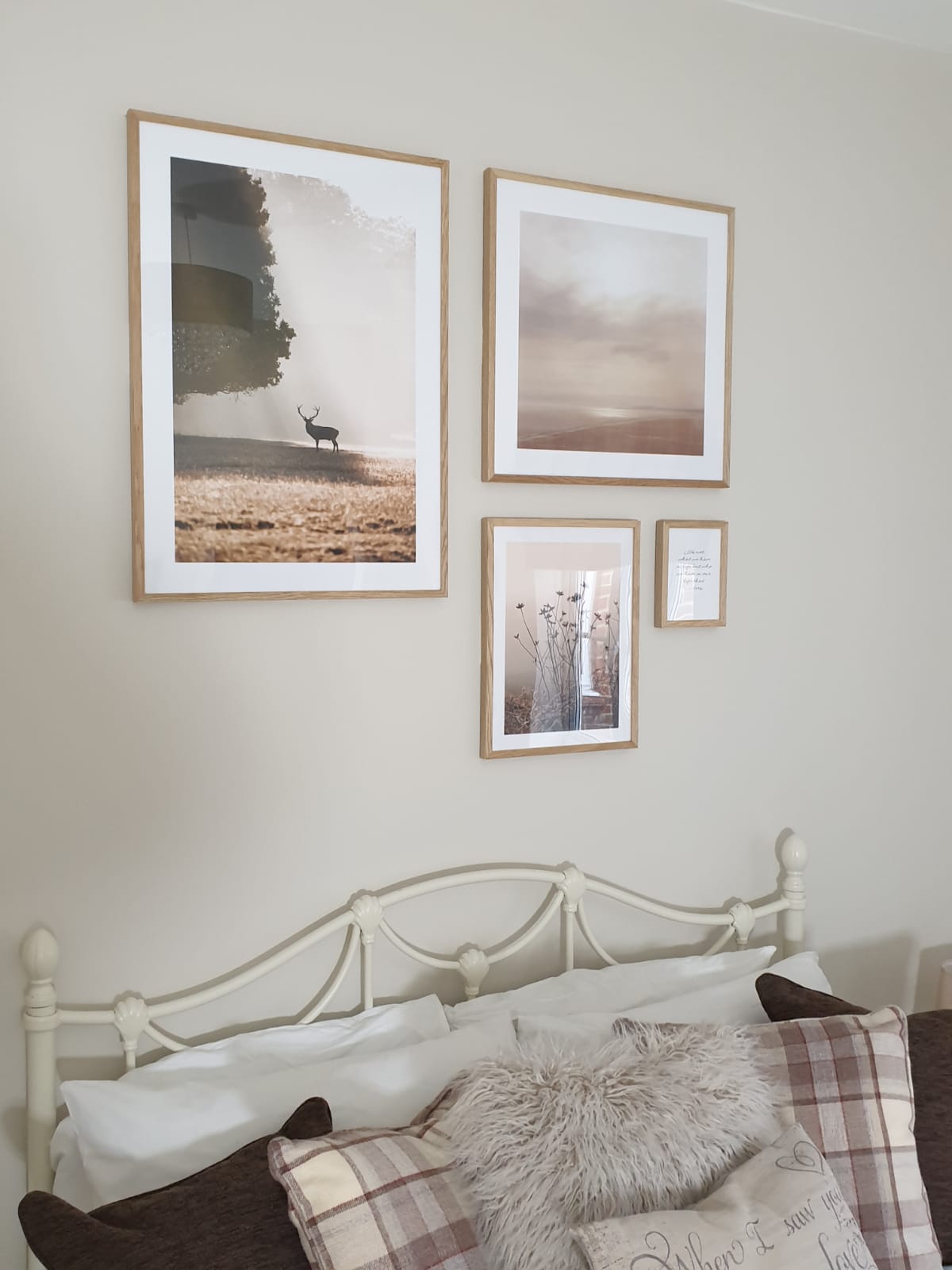 the 4 pictures on the wall above the bed