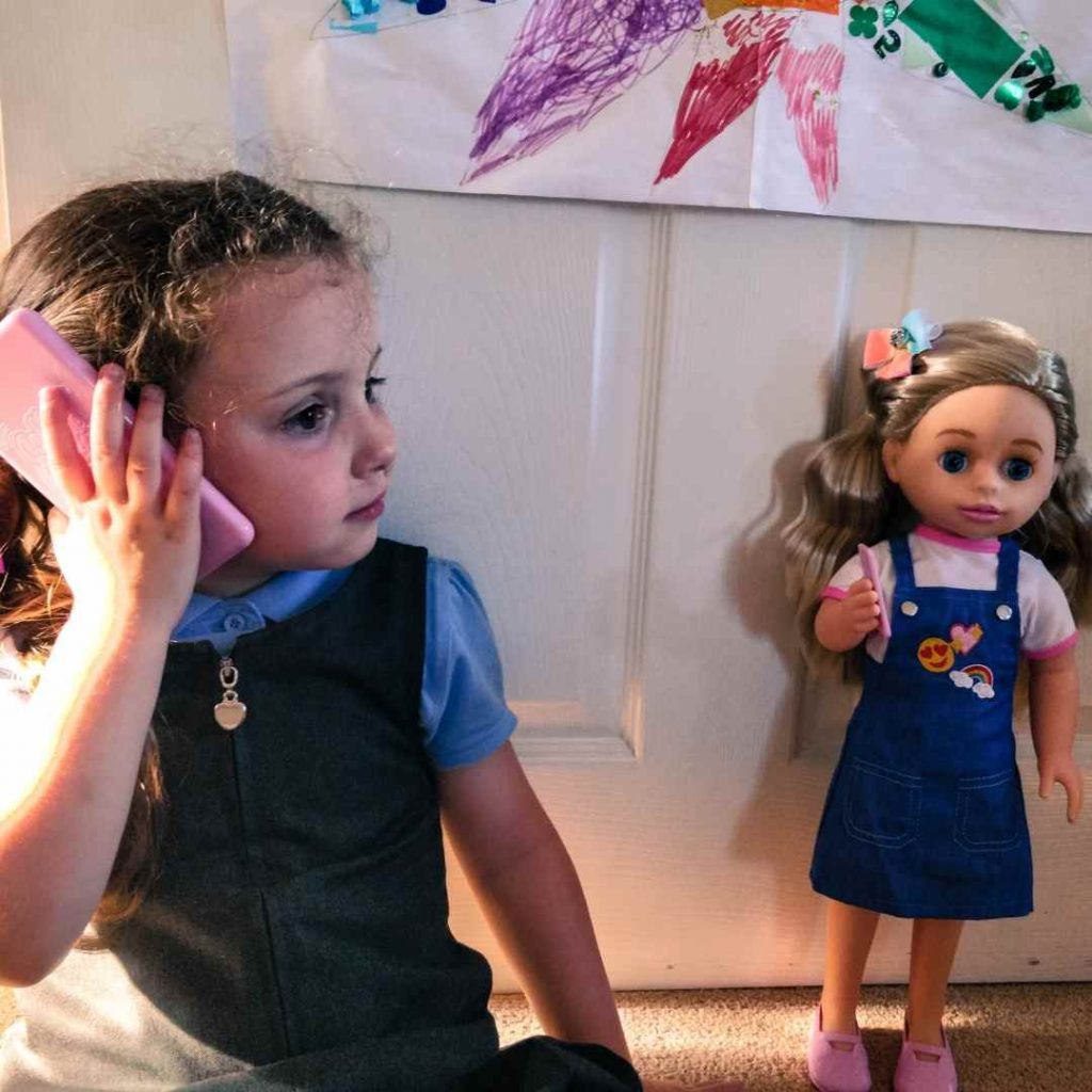 Alyssa calling the call me chloe doll on the phone
