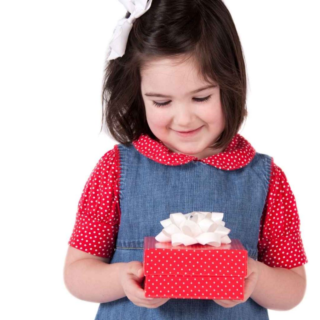 kids birthday girl holding present